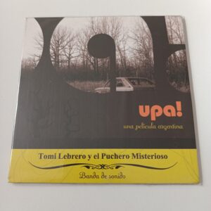 Tomi Lebrero Y El Puchero Misterioso - Upa! / De Tamae Garateguy, Santiago Giralt y Camila Toker